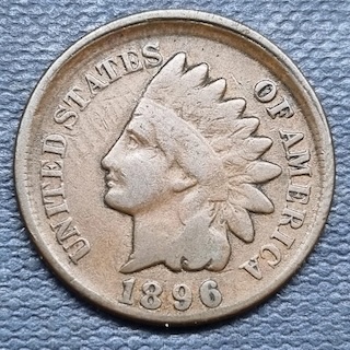 1896 Indian Head Penny off-center strike showing shifted design with blank planchet area and visible date